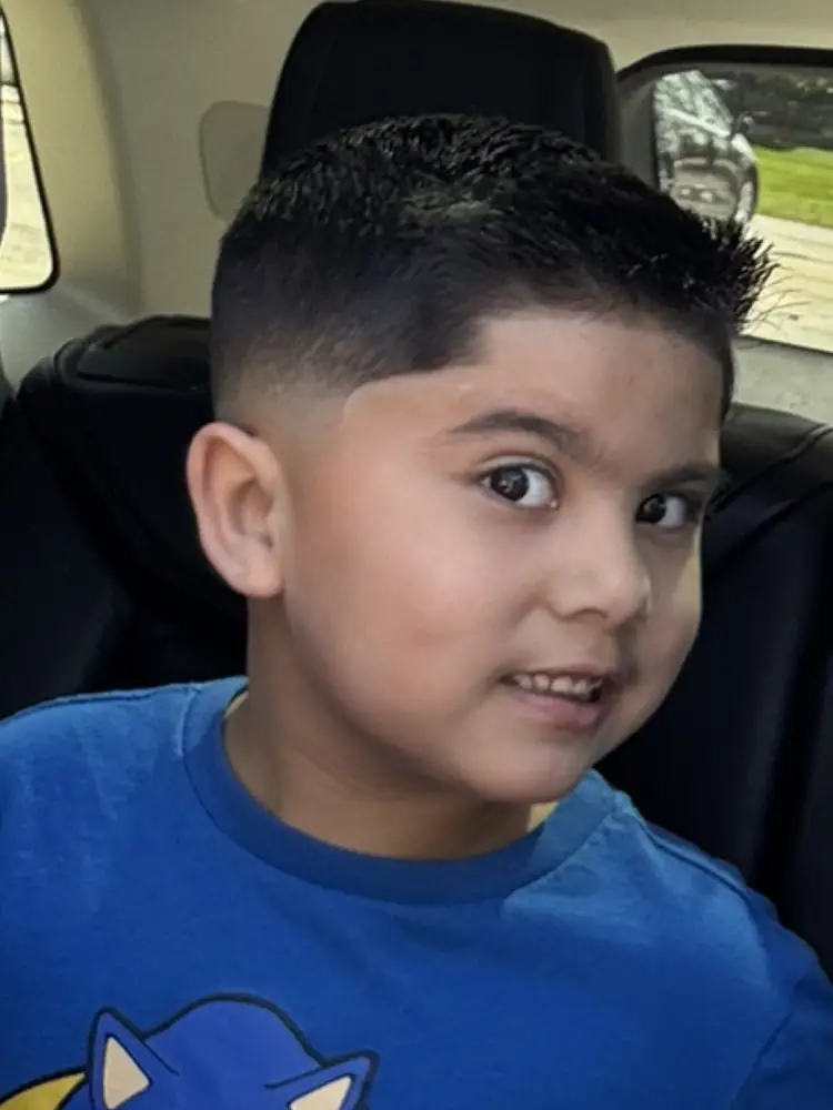 Happy young client with a fresh fade