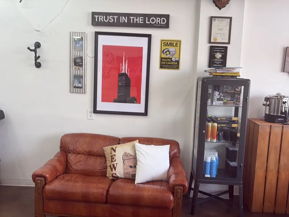 Leather couch under the Chicago print